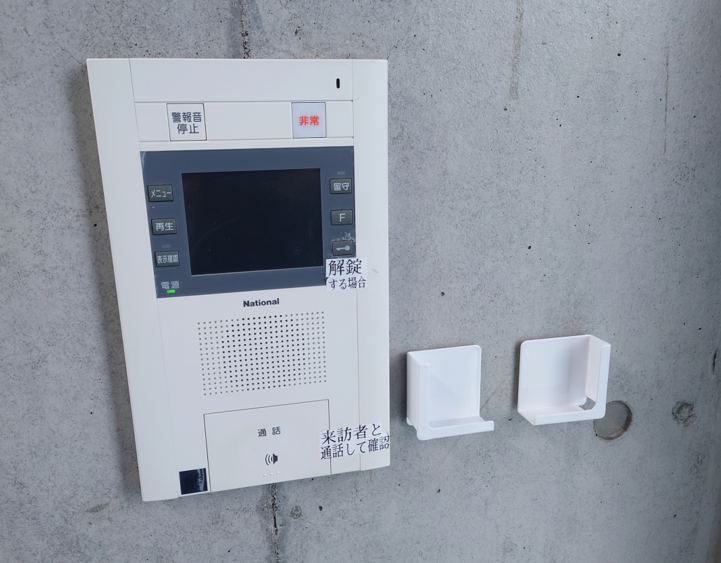 Photo of the wall with only the tablet holder attached